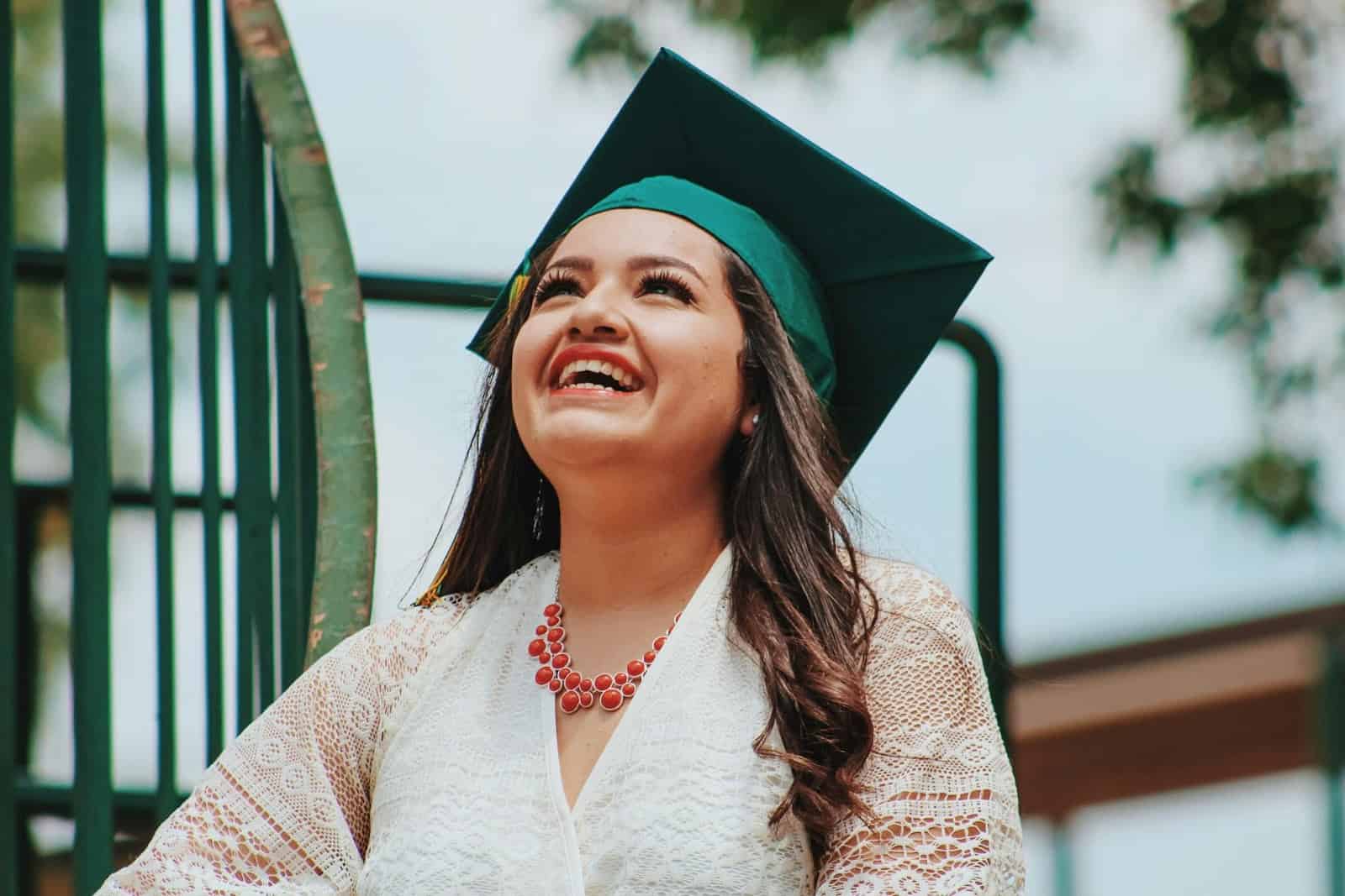 a woman wearing a graduation cap